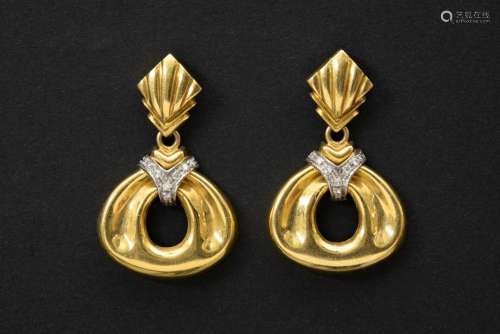 pair of vintage earrings in white and yellow gold (18 carat)...
