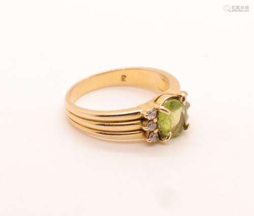 BAGUE EN OR JAUNE 585/°°° SERTIE DE 6 PETITS DIAMANTS ET D'U...