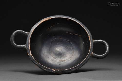 GREEK BLACK GLAZED TERRACOTTA TWO-HANDLED KYLIX