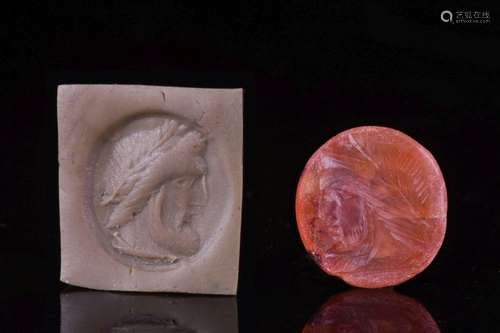 ROMAN CARNELIAN INTAGLIO WITH HEAD OF ZEUS