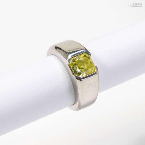 A platinum and fancy yellow diamond gypsy ring