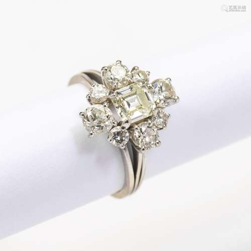 A 14 carat white gold and diamond cluster ring