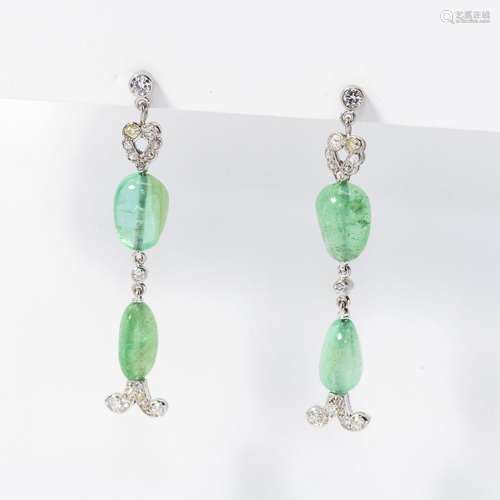 A pair of diamond and emerald earrings