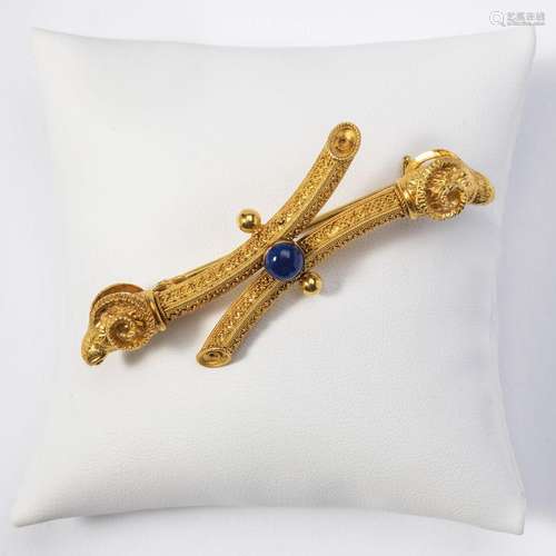 A 14 carat gold and lapis lazuli brooch