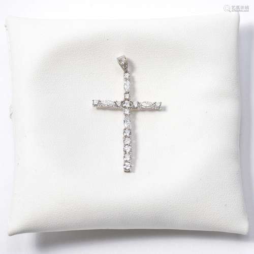 An 18 carat white gold and diamond pendant cross