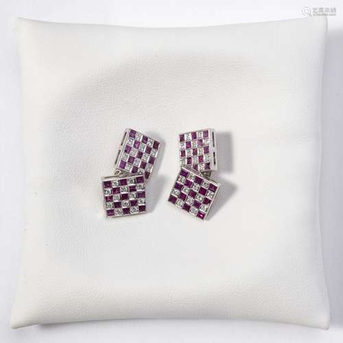 A pair of 18 carat white gold diamond and ruby cufflinks