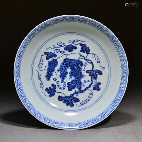 Blue and white plate with grape pattern inside and lotus pat...