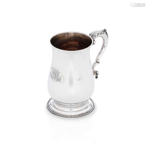 Mug. Argento fuso, sbalzato e cesellato. Londra 1784, marchi...