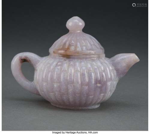 A Chinese Carved Jadeite Teapot 4 x 5-5/8 x 3-1/2 inches (10...