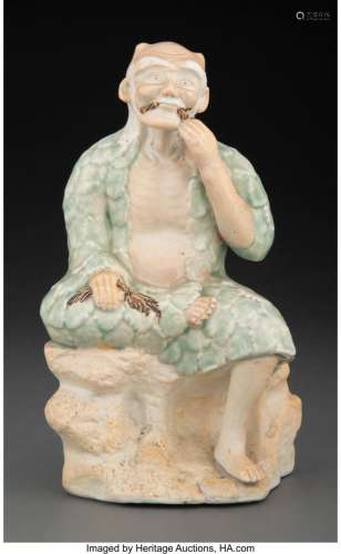 A Japanese Porcelain Figure with Celadon Glaze Marks: artist...