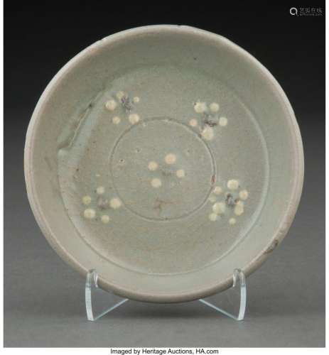 A Korean Celadon Glazed Dish with Five Flower Design
