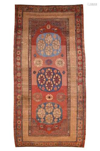 A ‘KHOTAN’ POMEGRANATES CARPET