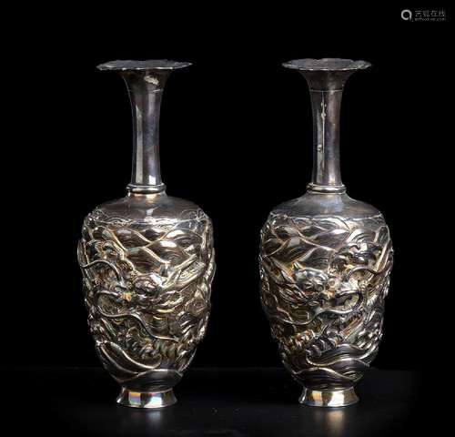 A PAIR OF SILVER SMALL VASES