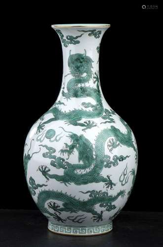 A GREEN ENAMELED PORCELAIN BOTTLE VASE