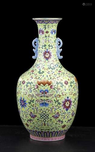 A POLYCHROME ENAMELED GREEN GROUND PORCELAIN BALUSTER VASE