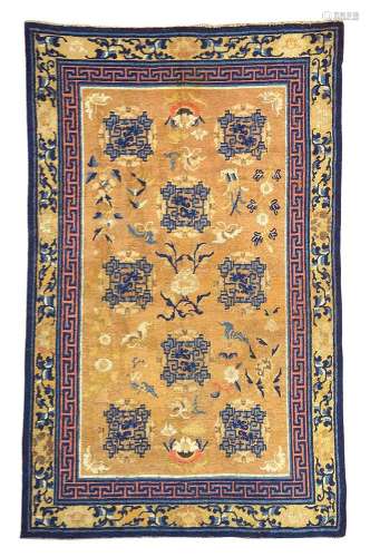 A ‘NINGXIA' CARPET WITH STYLIZED DRAGONS, FLOWERS AND BUTTER...