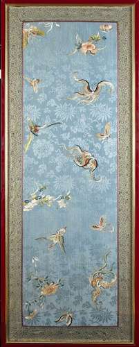 AN EMBROIDERED SILK PANEL