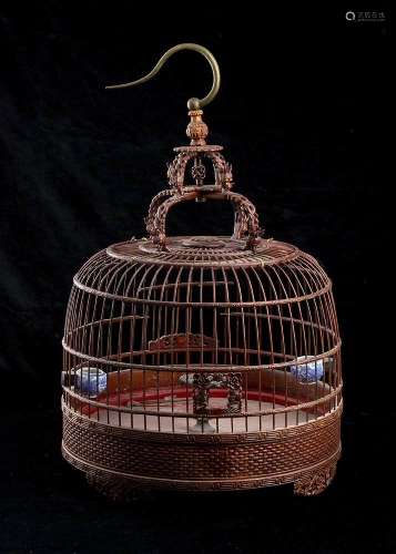 A BAMBOO BIRDCAGE WITH TWO ‘BLUE AND WHITE’ PORCELAIN BIRD F...