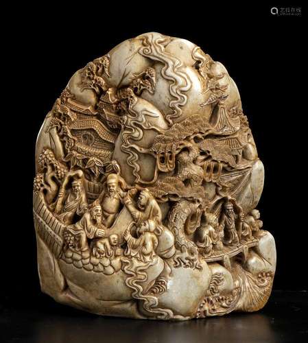 A SOAPSTONE CARVING WITH FIGURES IN A LANDSCAPE