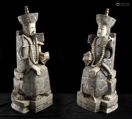 A PAIR OF BONE LARGE FIGURES OF AN EMPEROR AND AN EMPRESS