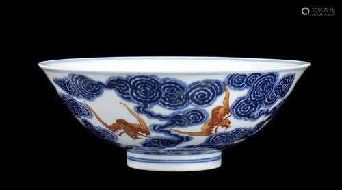 AN UNDERGLAZE BLUE AND IRON RED PORCELAIN ‘BATS’ BOWL