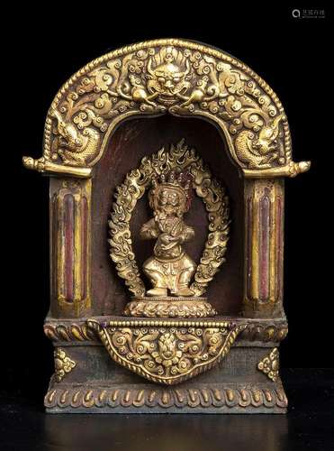 A PAINTED WOOD AND GILT BRONZE SMALL TEMPLE WITH A GILT AND ...