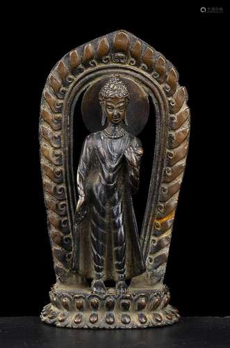 A BRONZE BUDDHA