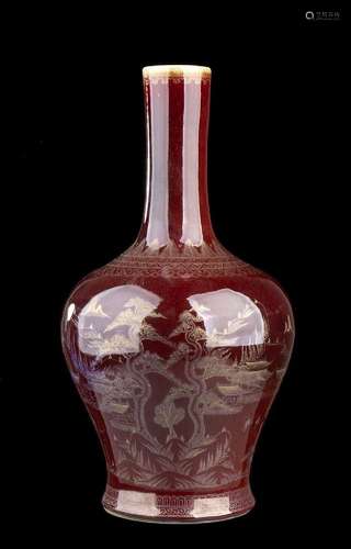 A RED GLAZED AND GILT DECORATED PORCELAIN ‘LANDSCAPE’ BOTTLE...