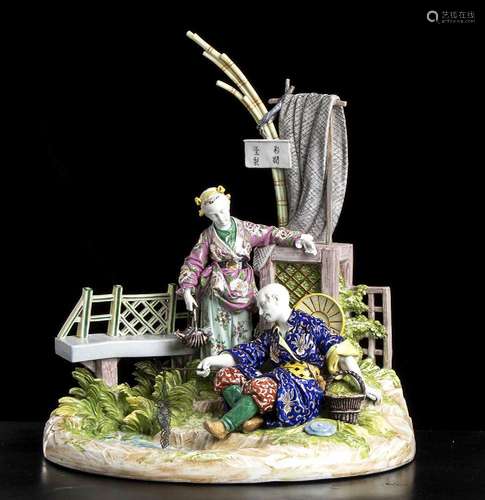 A POLYCHROME ENAMELED PORCELAIN LARGE GROUP WITH A CHINOISER...