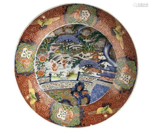 A LARGE POLYCHROME ENAMELED PORCELAIN DISH