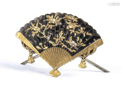 A PARTIALLY GILT METAL FAN-SHAPED CARD HOLDER WITH A RELIEF ...