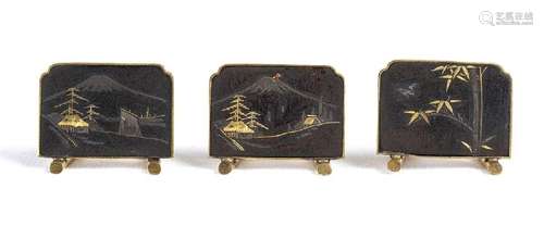 THREE PARTIALLY GILT METAL CARD HOLDERS