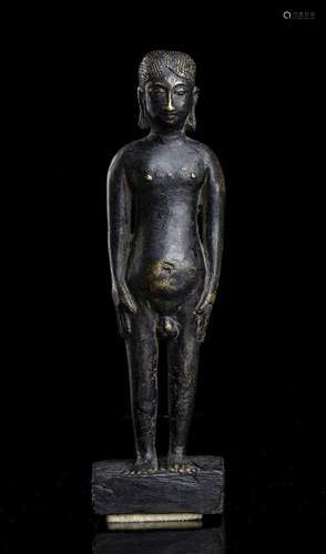 A BRONZE STANDING MALE FIGURE