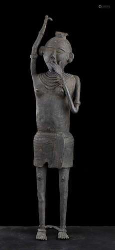 A BRONZE STANDING FEMALE FIGURE