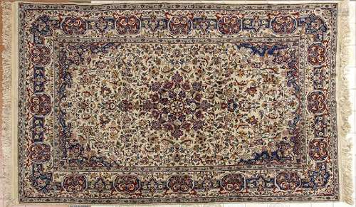 A CARPET WITH POLYCHROME FLORAL DECORATION