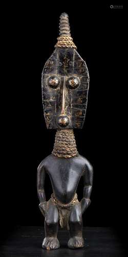 A WOOD, BRASS AND ROPE ANTHROPOMORPHIC FIGURE