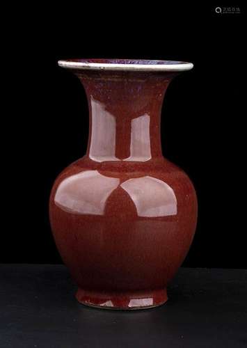 A ‘SANG DE BOEUF’ GLAZED PORCELAIN SMALL VASE