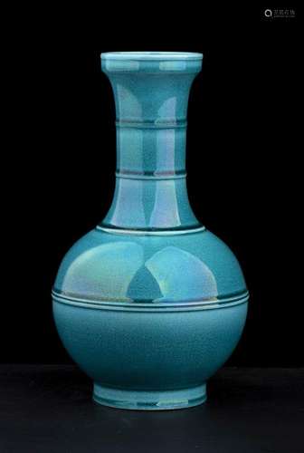 A TURQUOISE GLAZED PORCELAIN VASE