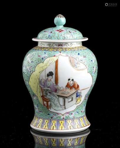 A POLYCHROME ENAMELED PORCELAIN VASE AND COVER