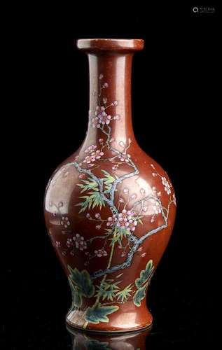 A POLYCHROME ENAMELED PORCELAIN BOTTLE VASE