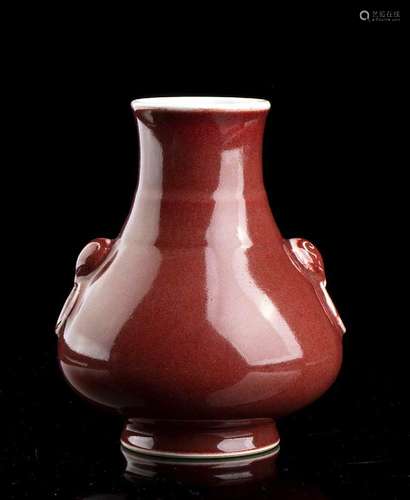 A RED GLAZED PORCELAIN HU VASE