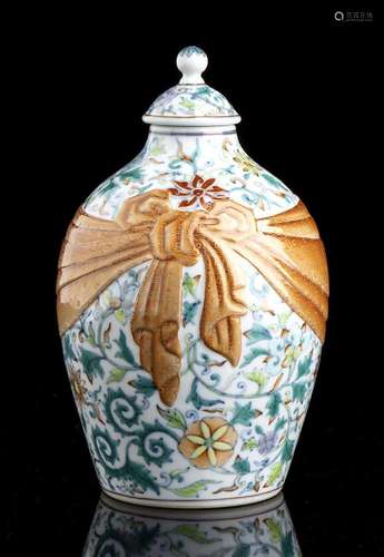 A POLYCHROME ENAMELED PORCELAIN VASE AND COVER