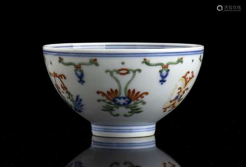 A POLYCHROME ENAMELED PORCELAIN BOWL