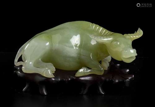 A GREEN STONE BUFFALO