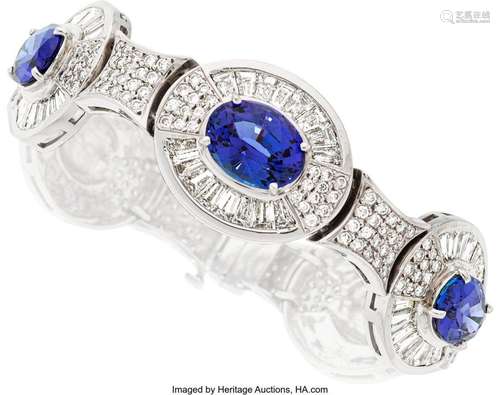 Tanzanite, Diamond, White Gold Bracelet  Stones: Oval-shaped...