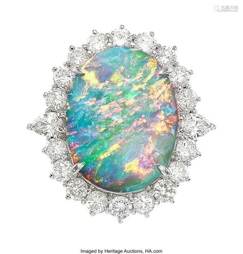 Opal, Diamond, Platinum Ring   Stones: Opal cabochon weighin...