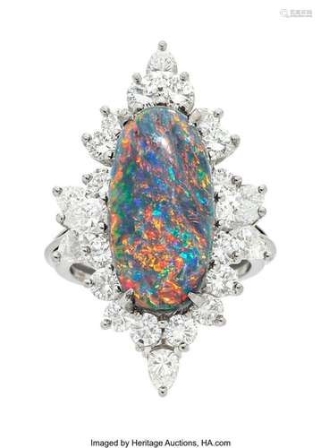 Opal, Diamond, Platinum Ring  Stones: Opal cabochon; full an...