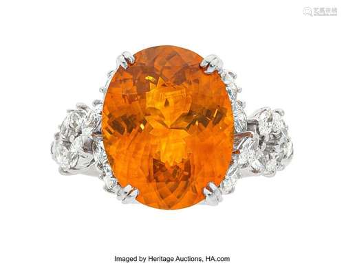 Orange Sapphire, Diamond, Platinum Ring  Stones: Oval-shaped...