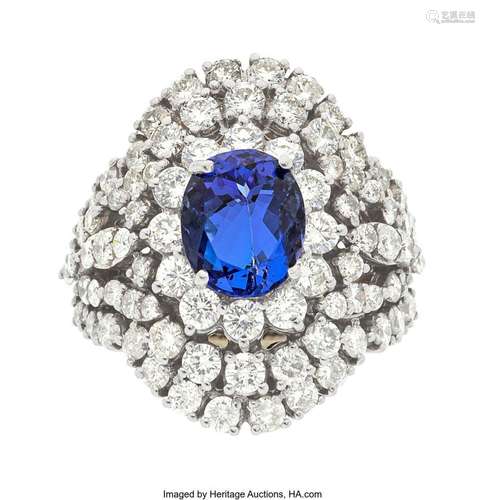 Tanzanite, Diamond, White Gold Ring  Stones: Oval-shaped tan...