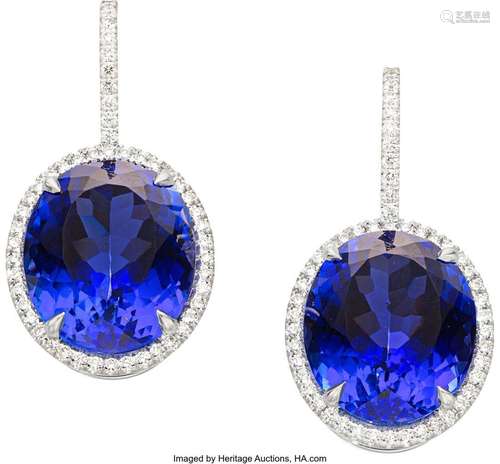 Tanzanite, Diamond, White Gold Earrings  Stones: Oval-shaped...